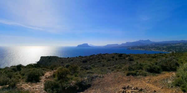 View from Cap d'Or along the coast to the Peñón de Ifach and Benidorm