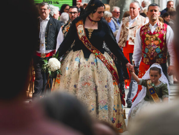 Fallera with her daughter during flower offering, Denia Fallas 2026