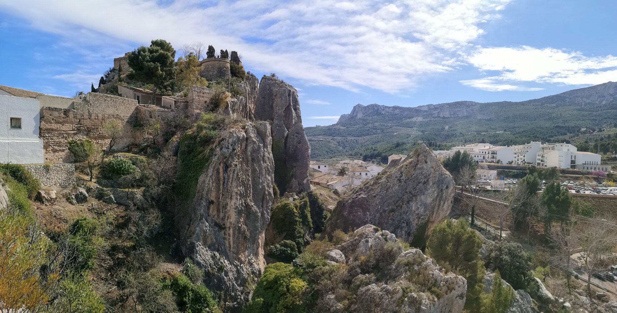 Ruins of Guadalest Castle (Castillo de San José) on the crags above the village and mountains